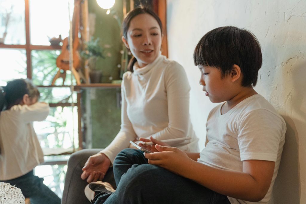 A mother talking to her young son