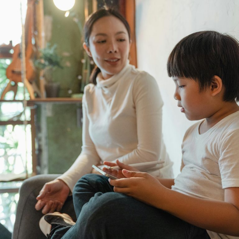 A mother talking to her young son